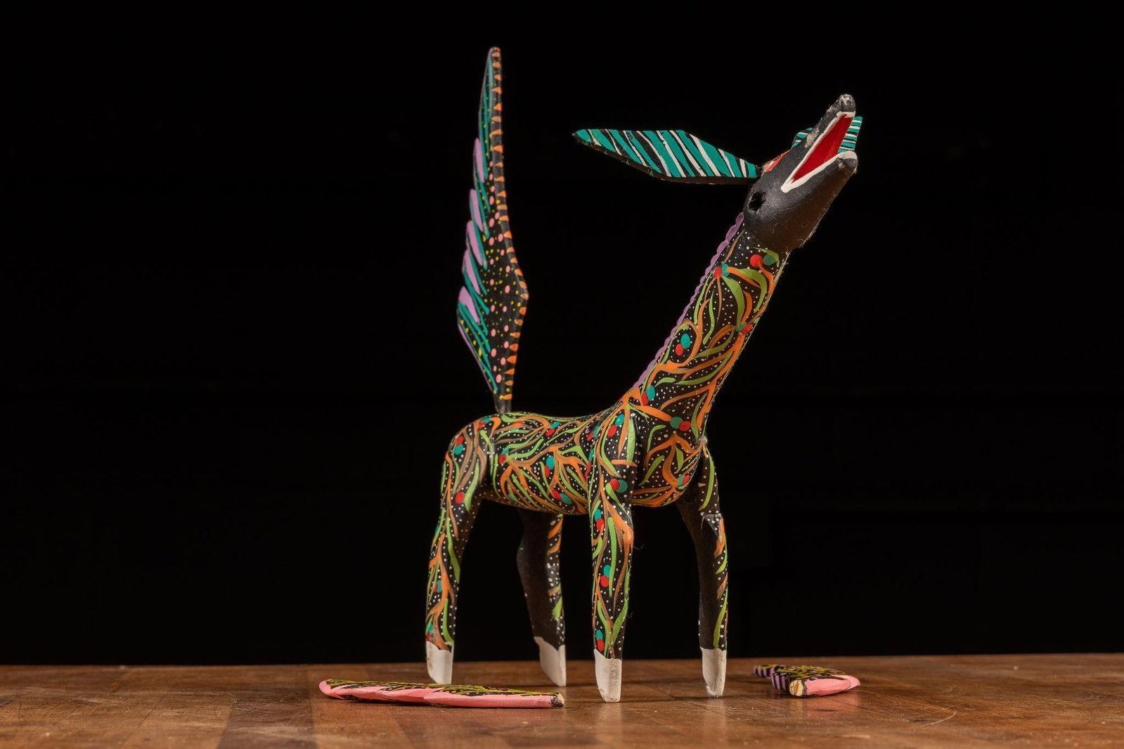Vintage Deer Alebrije Mexican Folk Art: Item SKU: 301600 Artist: Anita Gomez Medium: Acrylic on Copal Date: 20th Century Movement/Style: Folk Art Dimensions: 5" x 10.5" x 10" Origin: Oaxaca Condition: The ears/antlers have come unglued.