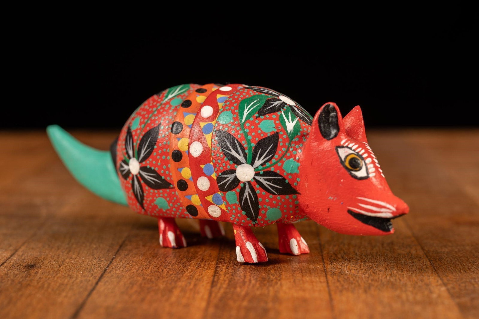 Vintage Armadillo Alebrije Mexican Folk Art: Item SKU: 301608 Artist: Andres Hernandez Cruz Medium: Acrylic on Copal Date: 20th Century Movement/Style: Folk Art Dimensions: 5.25" x 1.5" x 1.5" Origin: Tilcajete, Oaxaca Condition: Excellent