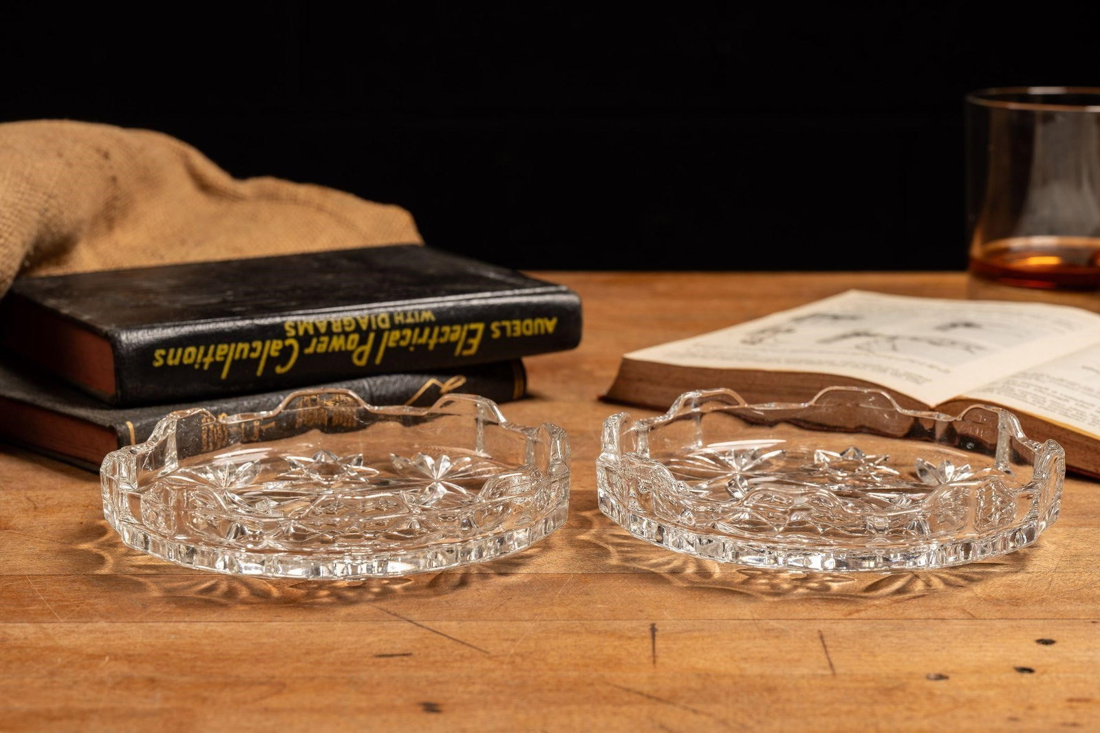 Cut Glass Lidded Double Ashtray: Item SKU: C-10133 Pair of cut glass ashtrays. The two pieces fit together to form a "lid" and base. Minor scratches/scuffs. 5" dia