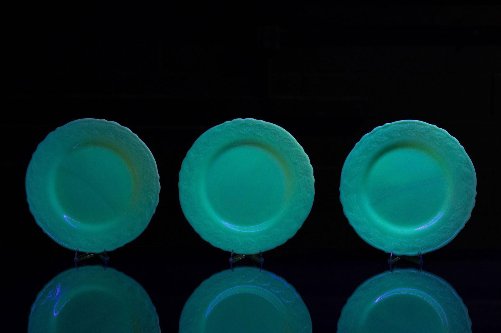 Three Custard Glass Laurel Dinner Plates by McKee: Item SKU: C-12114 McKee marked on bottom. Excellent condition, free of damage. 9" dia