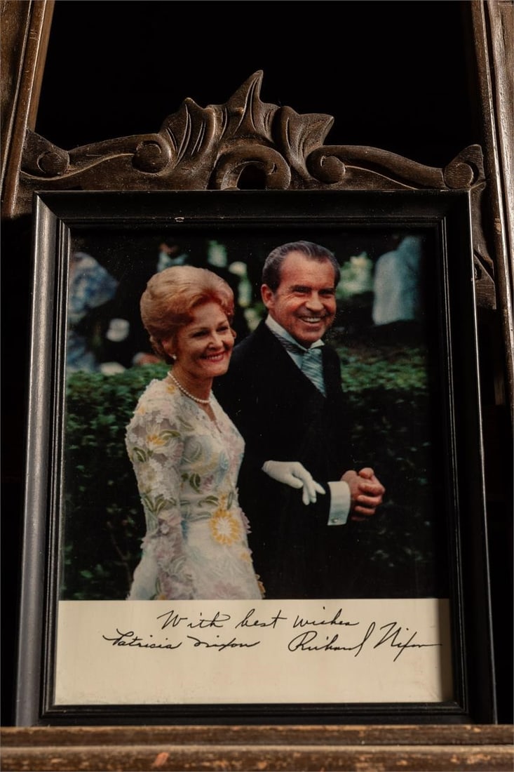 Autographed Picture Of Richard Nixon and Wife: Item SKU: C-7315 Signed image with "Best Wishes" from Richard and Pat Nixon. Exhibits small stains and scratches. 8.5" W x 11" H
