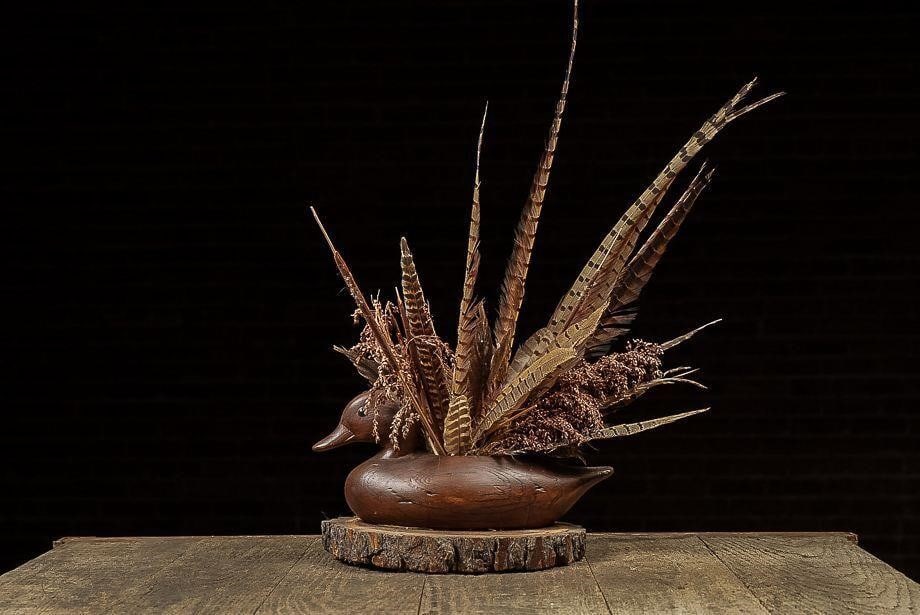 Vintage Ornamental Hand-Carved Duck Decoy on Base: NOTE: For an accurate in-house shipping quote on this lot, please reach out to us at rockauctiongallery@gmail.com. Item SKU: C-13436 Hollowed-out body houses an assortment of feathers and decorative d