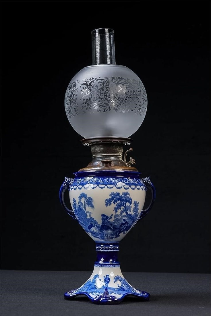 Victorian "Watteau" Oil Lamp by Doulton: NOTE: For an accurate in-house shipping quote on this lot, please reach out to us at rockauctiongallery@gmail.com. Item SKU: C-17608 A striking flow blue oil lamp in the "Watteau" pattern by Doulton,