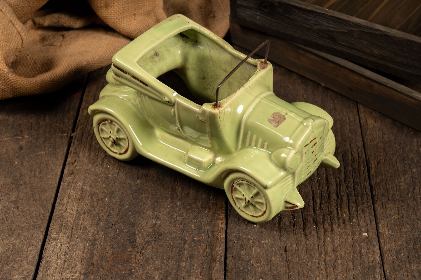 Art Deco Ceramic Model T-Type Car Planter: **NOTE: Any shipping quotes provided on this screen are provided by Live Auctioneers. For an in-house shipping quote on this lot, please reach out to us at rockauctiongallery@gmail.com.** 