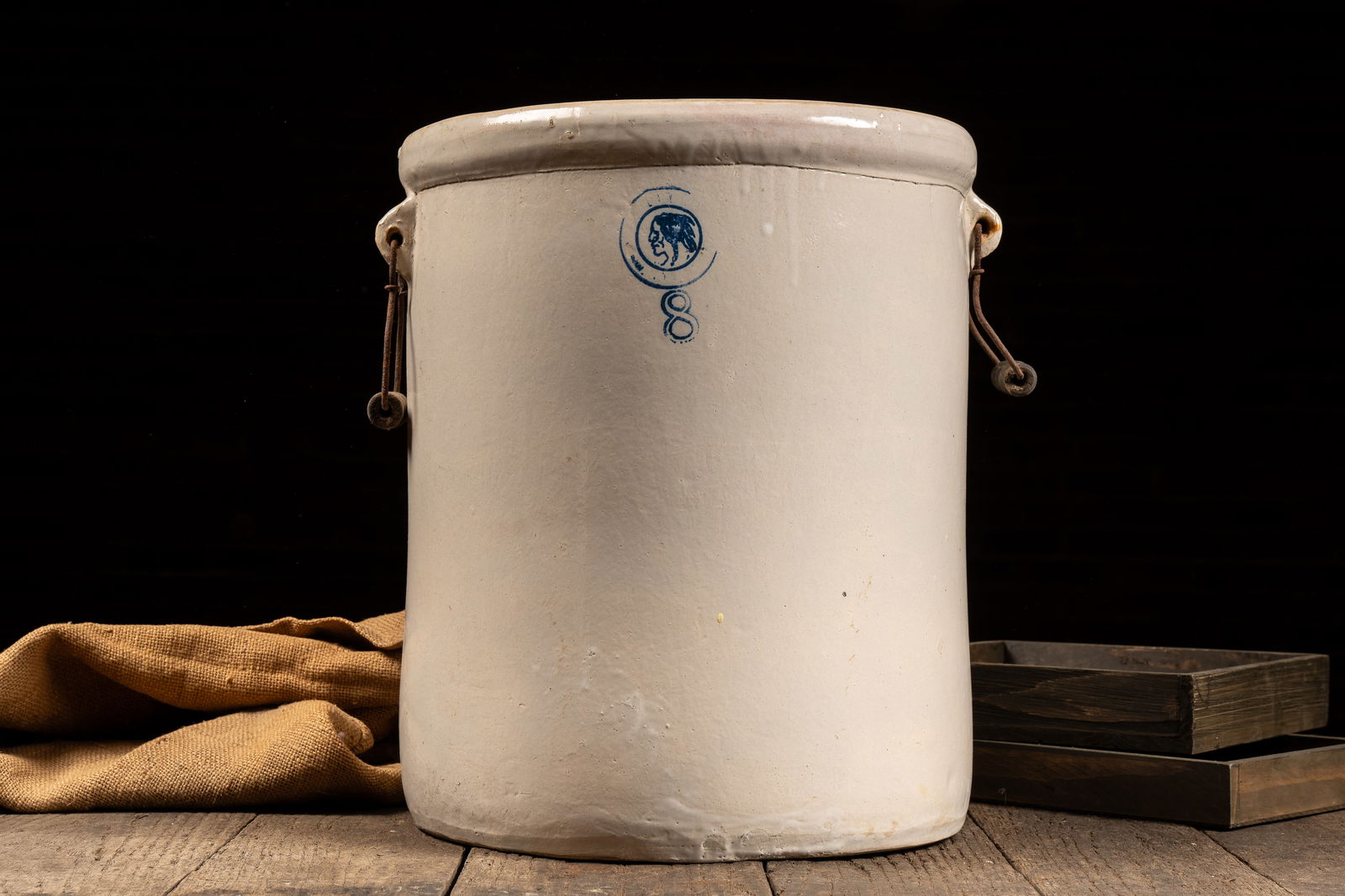 8 Gal. Stoneware Crock w Native American Head Mark: **NOTE: Any shipping quotes provided on this screen are provided by Live Auctioneers. For an in-house shipping quote on this lot, please reach out to us at rockauctiongallery@gmail.com.** 