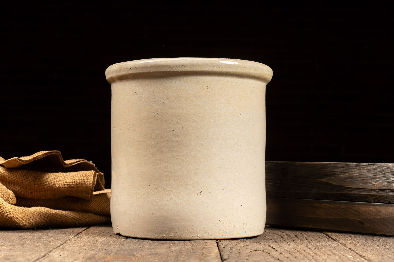 Off White Unmarked Stoneware Crock: **NOTE: Any shipping quotes provided on this screen are provided by Live Auctioneers. For an in-house shipping quote on this lot, please reach out to us at rockauctiongallery@gmail.com.** 