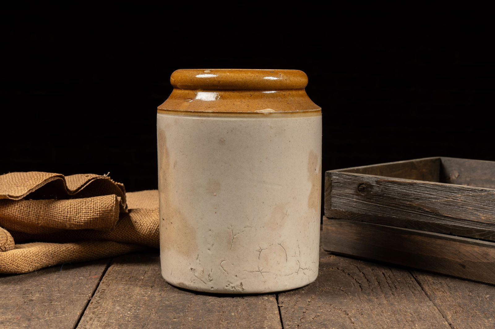 Small Stoneware Crock w Brown Lip: **NOTE: Any shipping quotes provided on this screen are provided by Live Auctioneers. For an in-house shipping quote on this lot, please reach out to us at rockauctiongallery@gmail.com.** C-18611