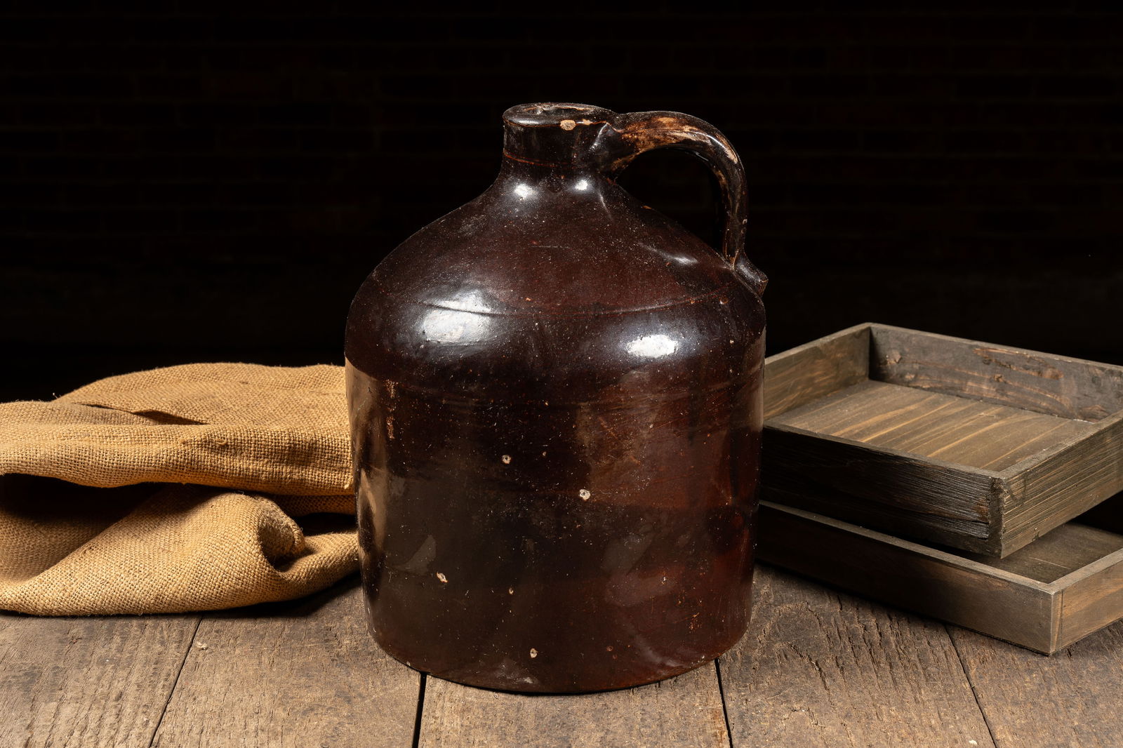 Dark Brown Stoneware Crock Jug: **NOTE: Any shipping quotes provided on this screen are provided by Live Auctioneers. For an in-house shipping quote on this lot, please reach out to us at rockauctiongallery@gmail.com.** 