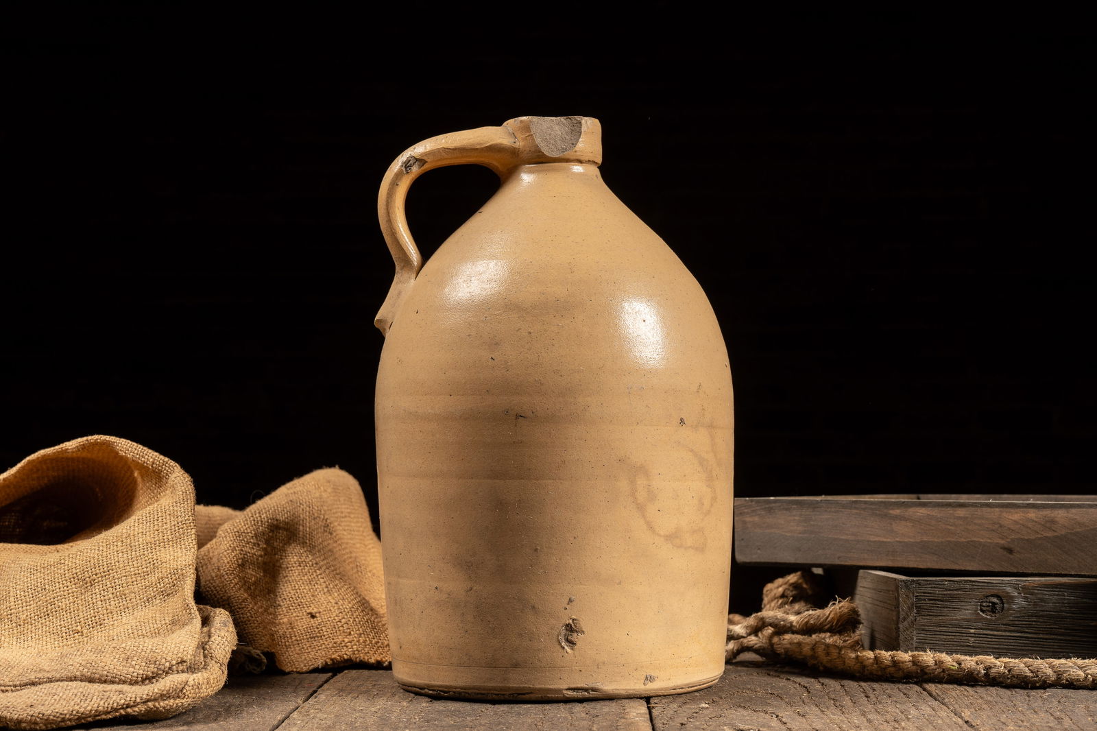 Beige Stoneware Crock Jug: **NOTE: Any shipping quotes provided on this screen are provided by Live Auctioneers. For an in-house shipping quote on this lot, please reach out to us at rockauctiongallery@gmail.com.** C-18631