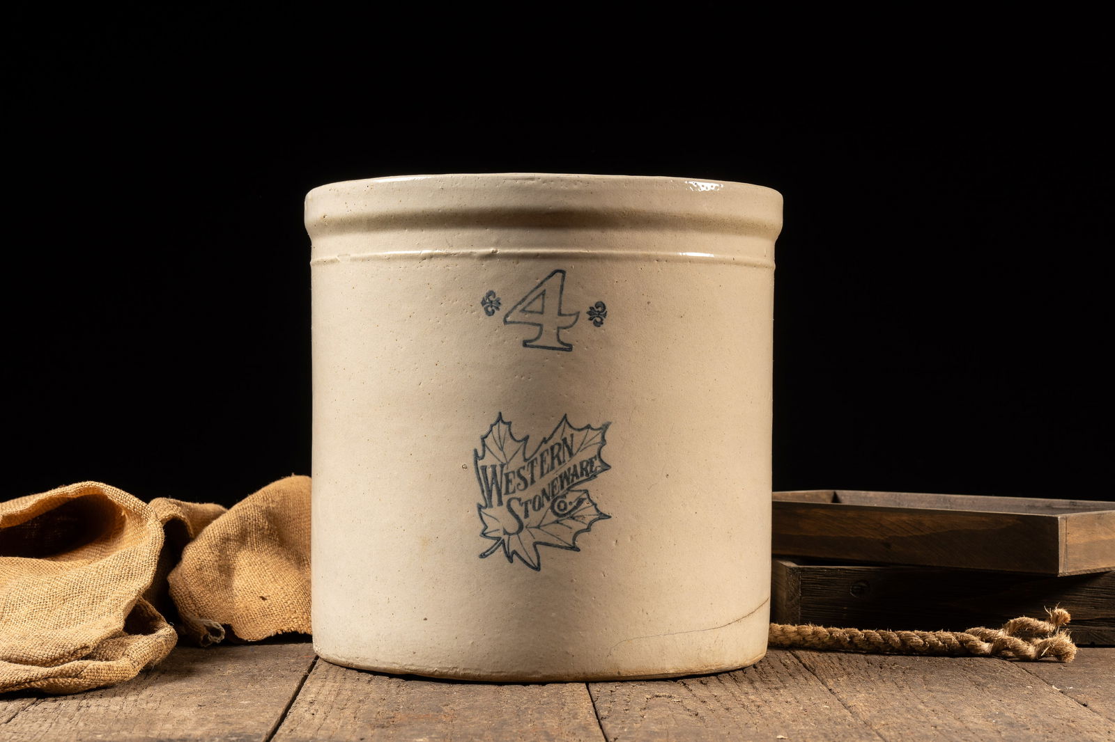 4 Gal. Crock by Western Stoneware: **NOTE: Any shipping quotes provided on this screen are provided by Live Auctioneers. For an in-house shipping quote on this lot, please reach out to us at rockauctiongallery@gmail.com.** C-18640