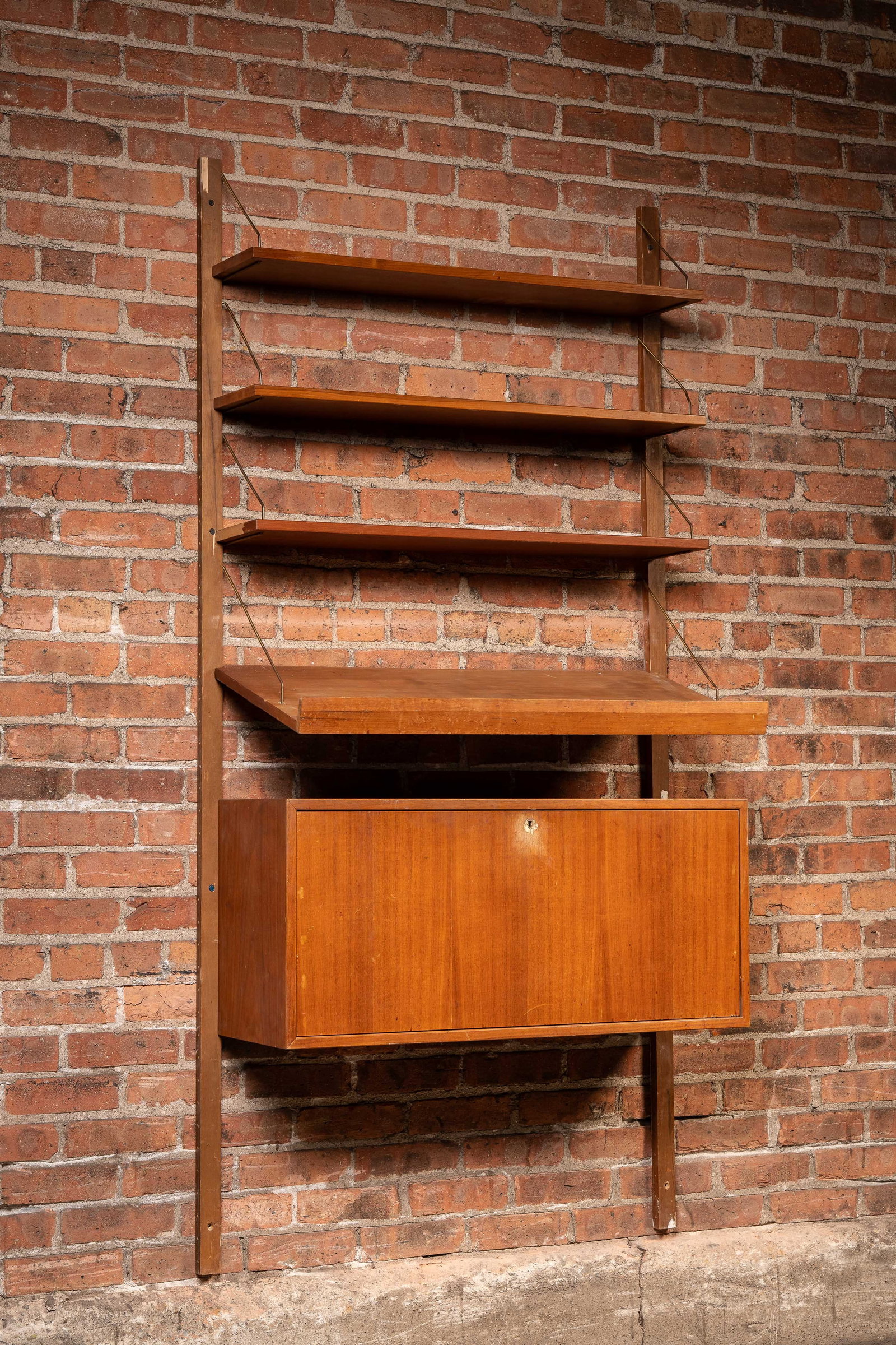 Danish Mid Century Modern Wall Mounted Drexel Desk: **NOTE: Any shipping quotes provided on this screen are provided by Live Auctioneers. For an in-house shipping quote on this lot, please reach out to us at rockauctiongallery@gmail.com.** C-19821 Dani