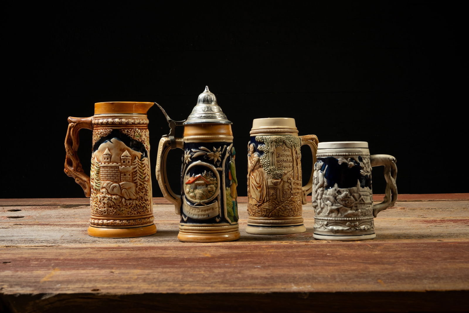 4 Vintage German Relief Beer Steins (1 of 6)