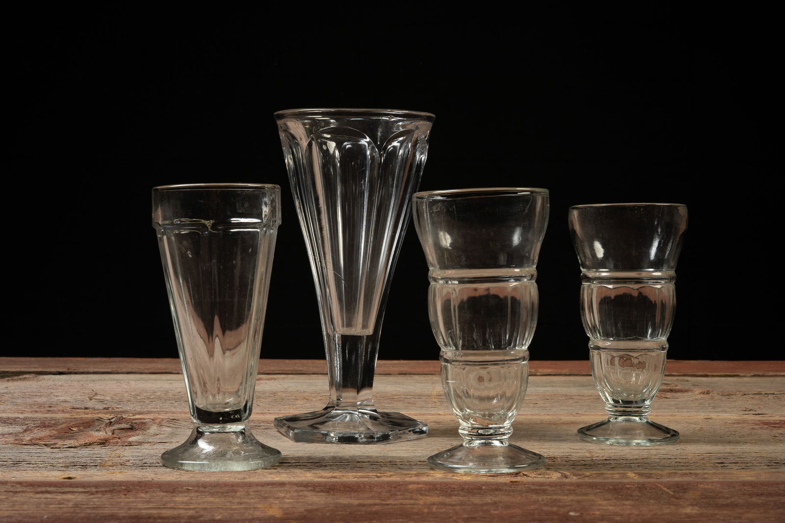 Lot of 4 Art Deco Clear Stemware Pieces: **NOTE: Any shipping quotes provided on this screen are provided by Live Auctioneers. For an in-house shipping quote on this lot, please reach out to us at rockauctiongallery@gmail.com.** 