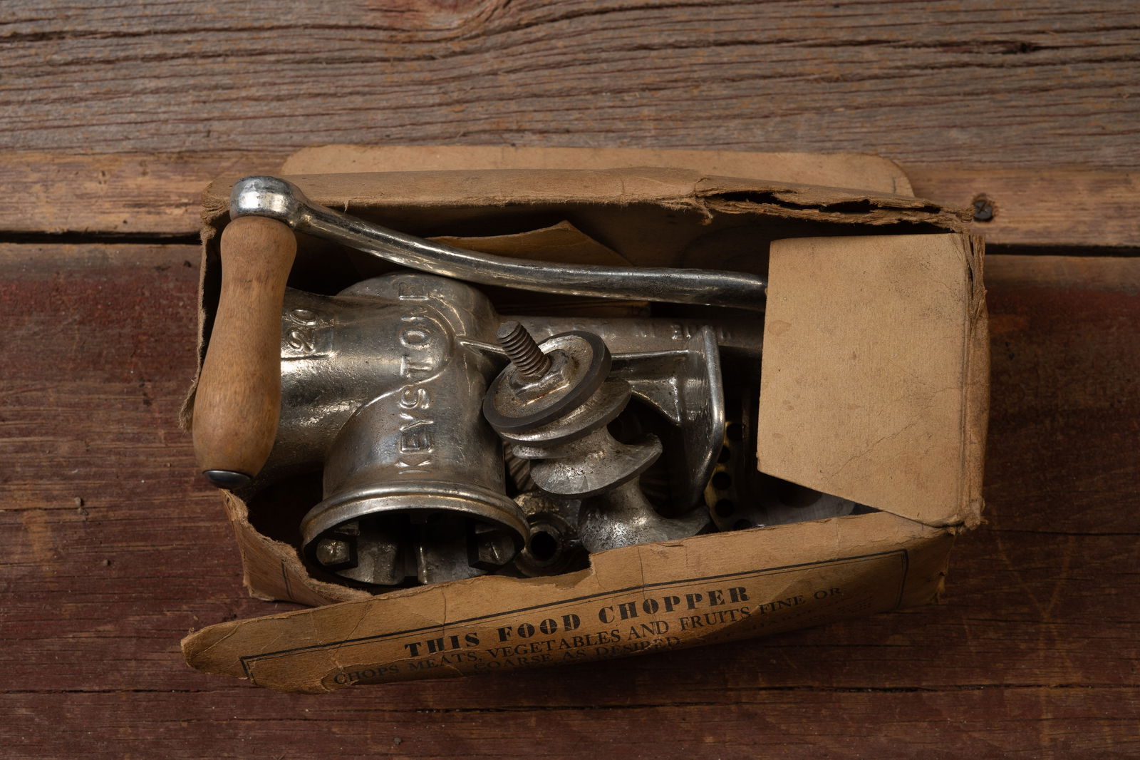 Boxed Keystone No. 20 Food Chopper with Parts: **NOTE: Any shipping quotes provided on this screen are provided by Live Auctioneers. For an in-house shipping quote on this lot, please reach out to us at rockauctiongallery@gmail.com.** 