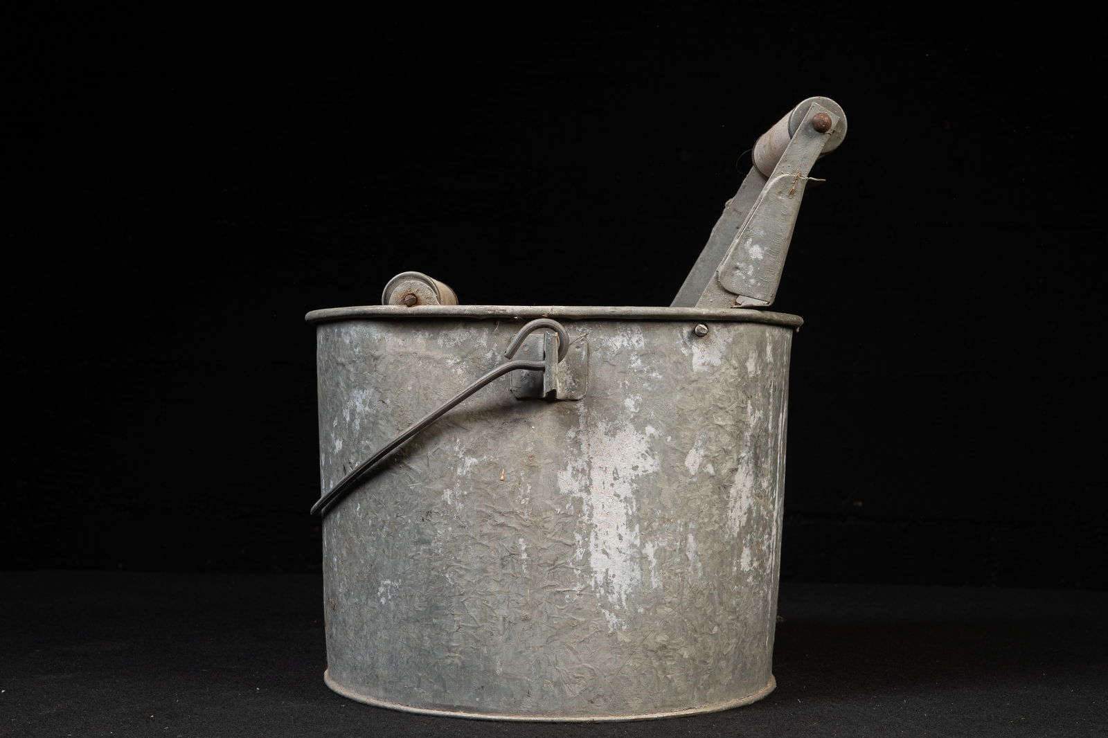 Vintage 'DeLuxe' Galvanized Steel Mop Bucket: **NOTE: Any shipping quotes provided on this screen are provided by Live Auctioneers. For an in-house shipping quote on this lot, please reach out to us at rockauctiongallery@gmail.com.** C-19296