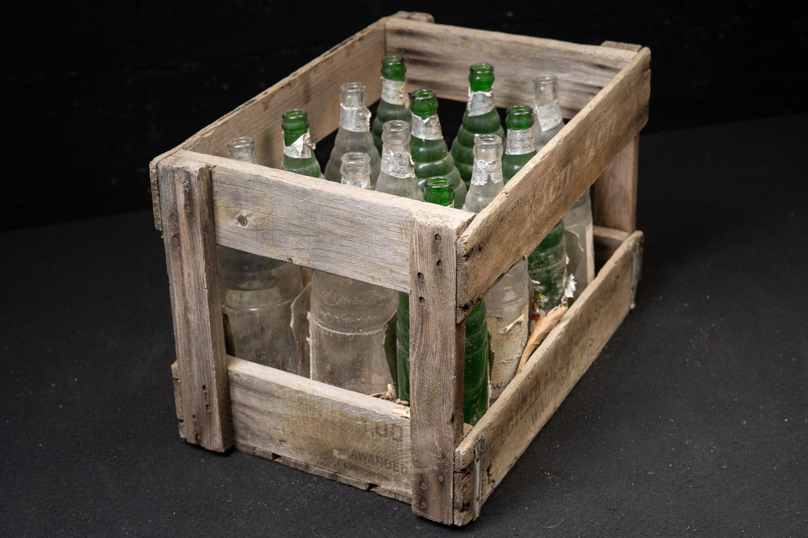 Vintage Crate of Graf's Glass Soda Bottles: **NOTE: Any shipping quotes provided on this screen are provided by Live Auctioneers. For an in-house shipping quote on this lot, please reach out to us at rockauctiongallery@gmail.com.** C-19381