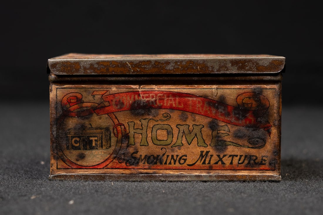 Commercial Travelers â€?Homeâ€? Smoking Mixture Tin: **NOTE: Any shipping quotes provided on this screen are provided by Live Auctioneers. For an in-house shipping quote on this lot, please reach out to us at rockauctiongallery@gmail.com.** C-19388