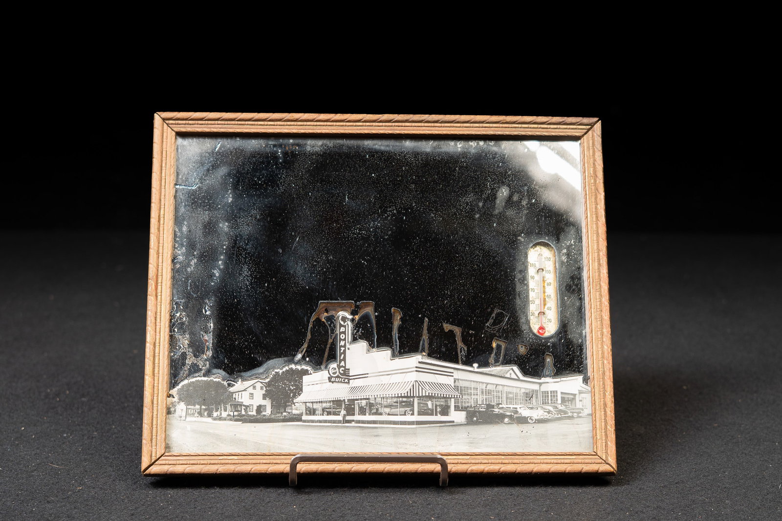 Vintage Mirrored Pontiac-Buick Desktop Thermometer: **NOTE: Any shipping quotes provided on this screen are provided by Live Auctioneers. For an in-house shipping quote on this lot, please reach out to us at rockauctiongallery@gmail.com.** C-19391