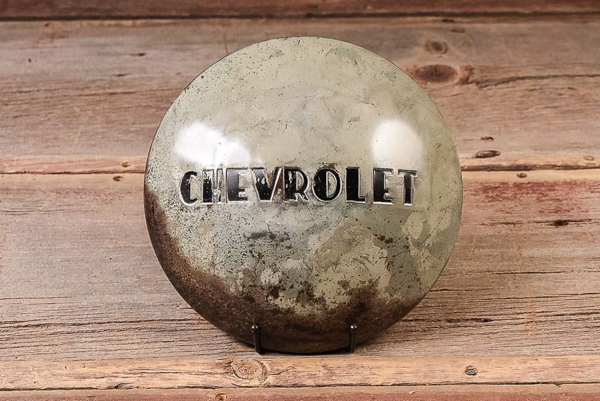 Chevrolet Embossed Steel Hubcap: **NOTE: Any shipping quotes provided on this screen are provided by Live Auctioneers. For an in-house shipping quote on this lot, please reach out to us at rockauctiongallery@gmail.com.** 