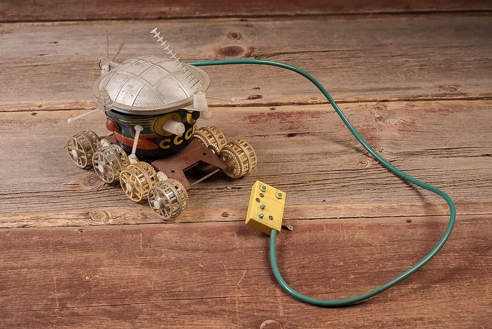 Soviet CCCP Remote Control Lunar Rover Toy: **NOTE: Any shipping quotes provided on this screen are provided by Live Auctioneers. For an in-house shipping quote on this lot, please reach out to us at rockauctiongallery@gmail.com.** 