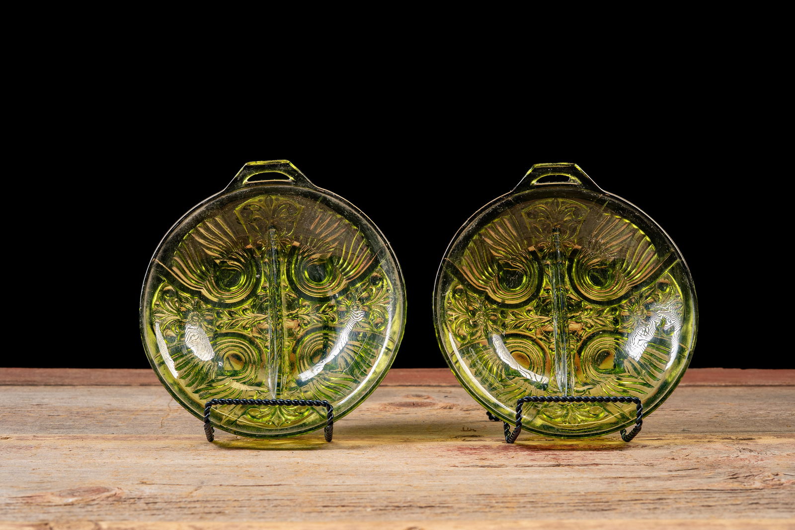 Pair of Pressed Glass Divided Ashtrays in Green: **NOTE: Any shipping quotes provided on this screen are provided by Live Auctioneers. For an in-house shipping quote on this lot, please reach out to us at rockauctiongallery@gmail.com.** 