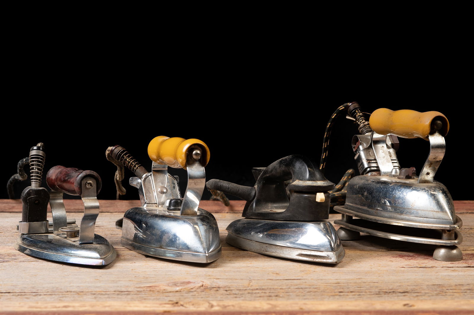 Set of 4 Vintage Clothing Irons: **NOTE: Any shipping quotes provided on this screen are provided by Live Auctioneers. For an in-house shipping quote on this lot, please reach out to us at rockauctiongallery@gmail.com.** 