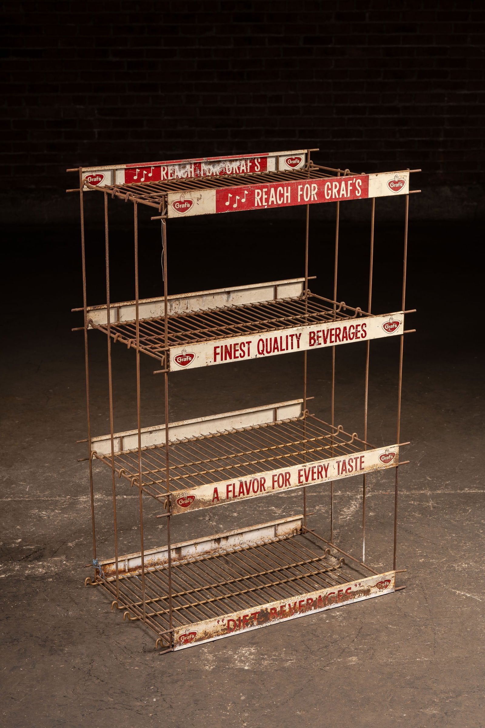 Graf's Bottled Soft Drink Wire Rack: **NOTE: Any shipping quotes provided on this screen are provided by Live Auctioneers. For an in-house shipping quote on this lot, please reach out to us at rockauctiongallery@gmail.com.** 