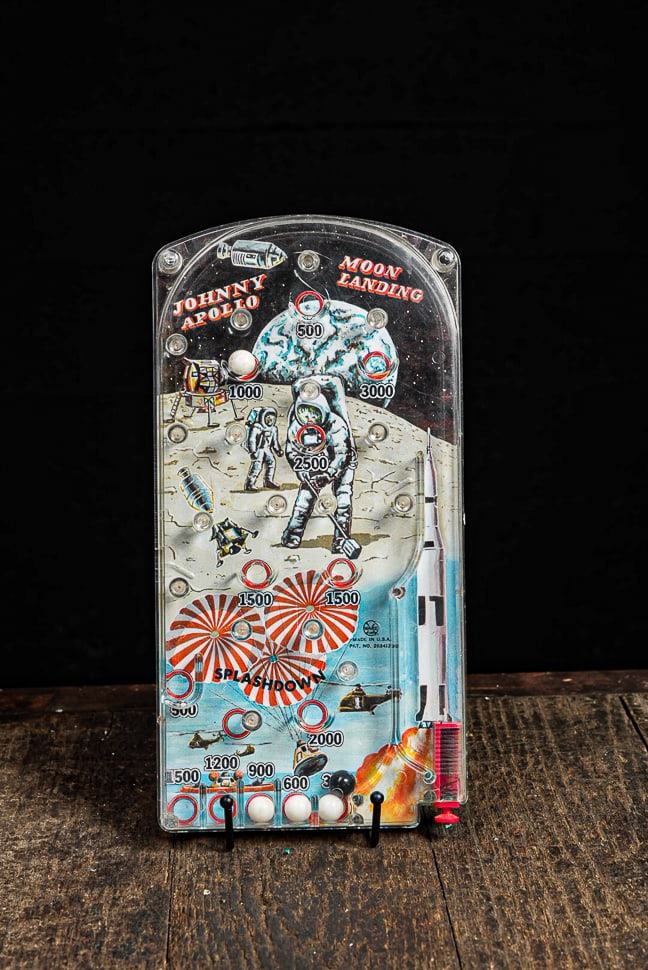 Johnny Apollo Moon Landing Mechanical Pinball Game: **NOTE: Any shipping quotes provided on this screen are provided by Live Auctioneers. For an in-house shipping quote on this lot, please reach out to us at rockauctiongallery@gmail.com.** C-14606 This