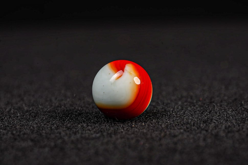 Vintage Akro Agate Oxblood on White - Onyx Series: **NOTE: Any shipping quotes provided on this screen are provided by Live Auctioneers. For an in-house shipping quote on this lot, please reach out to us at rockauctiongallery@gmail.com.** C-15855 This