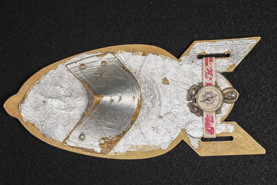 Flash Gordon Compass on Rocket-Shaped Display: **NOTE: Any shipping quotes provided on this screen are provided by Live Auctioneers. For an in-house shipping quote on this lot, please reach out to us at rockauctiongallery@gmail.com.** C-17721 Prem