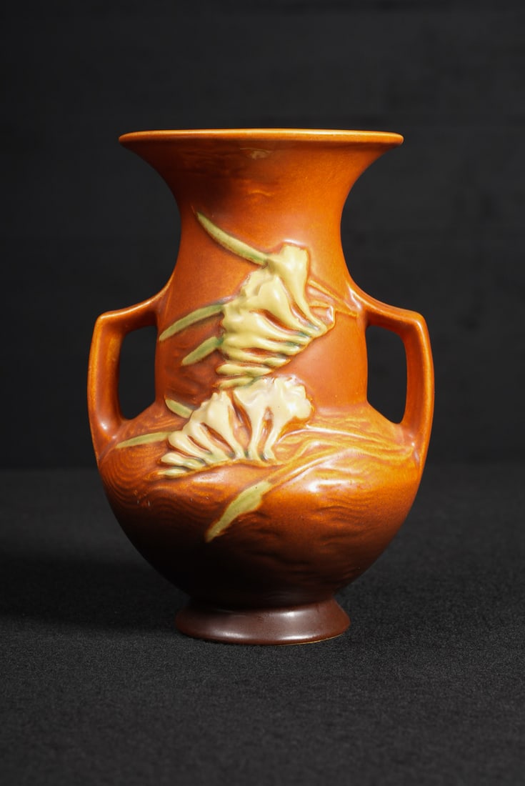 Vintage Freesia Vase by Roseville Pottery: **NOTE: Any shipping quotes provided on this screen are provided by Live Auctioneers. For an in-house shipping quote on this lot, please reach out to us at rockauctiongallery@gmail.com.** C-17816 c. 1