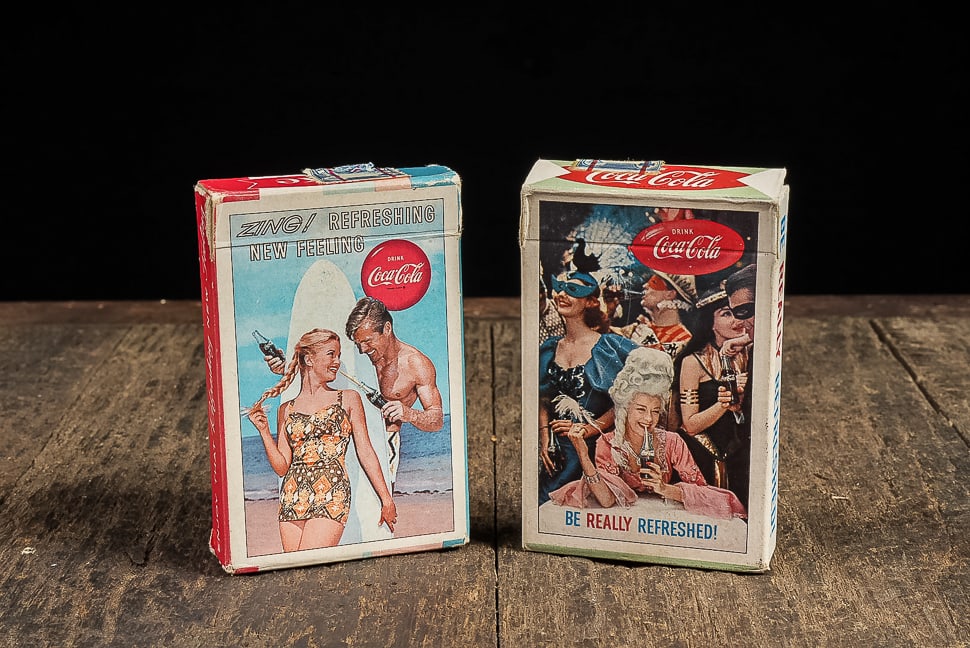 Coca-Cola Playing Card, Surf and Masquerade Themes: **NOTE: Any shipping quotes provided on this screen are provided by Live Auctioneers. For an in-house shipping quote on this lot, please reach out to us at rockauctiongallery@gmail.com.** C-14498 This