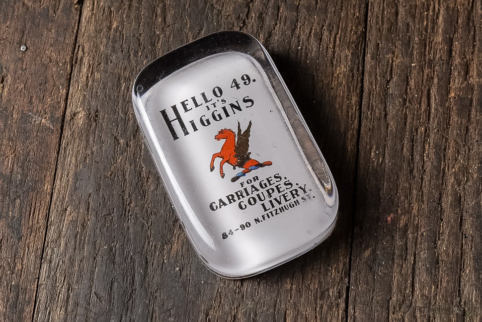 Antique Higgins Livery Service Paperweight: **NOTE: Any shipping quotes provided on this screen are provided by Live Auctioneers. For an in-house shipping quote on this lot, please reach out to us at rockauctiongallery@gmail.com.** C-14170 c. 1