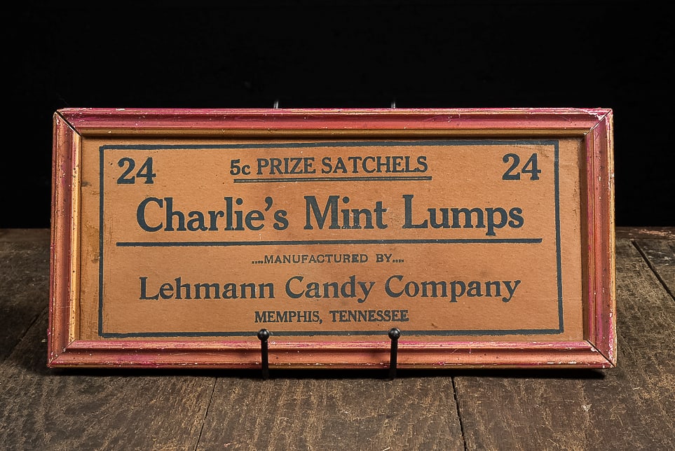 Framed Charlie’s Mint Lumps Candy Box Label Sign: **NOTE: Any shipping quotes provided on this screen are provided by Live Auctioneers. For an in-house shipping quote on this lot, please reach out to us at rockauctiongallery@gmail.com.** C-14407