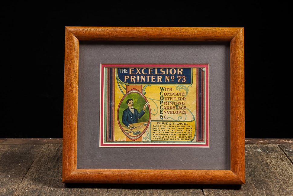 Excelsior Printer No. 73 Framed Display: **NOTE: Any shipping quotes provided on this screen are provided by Live Auctioneers. For an in-house shipping quote on this lot, please reach out to us at rockauctiongallery@gmail.com.** C-14447