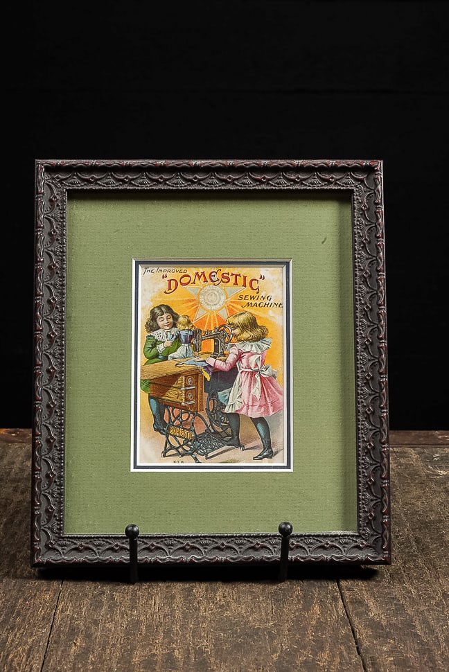 Domestic Sewing Machine Advertising Card: **NOTE: Any shipping quotes provided on this screen are provided by Live Auctioneers. For an in-house shipping quote on this lot, please reach out to us at rockauctiongallery@gmail.com.** C-14421 This