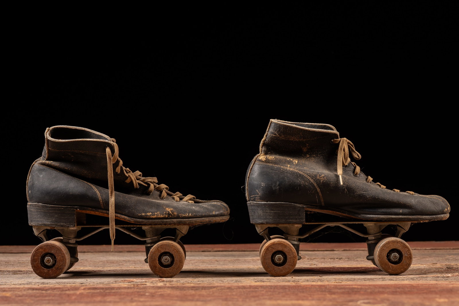 Antique Leather Roller Skates with Wooden Wheels: **NOTE: Any shipping quotes provided on this screen or on your Live Auctioneers invoice are provided by Live Auctioneers. In-house shipping is available on all lots. For in-house shipping quotes, plea