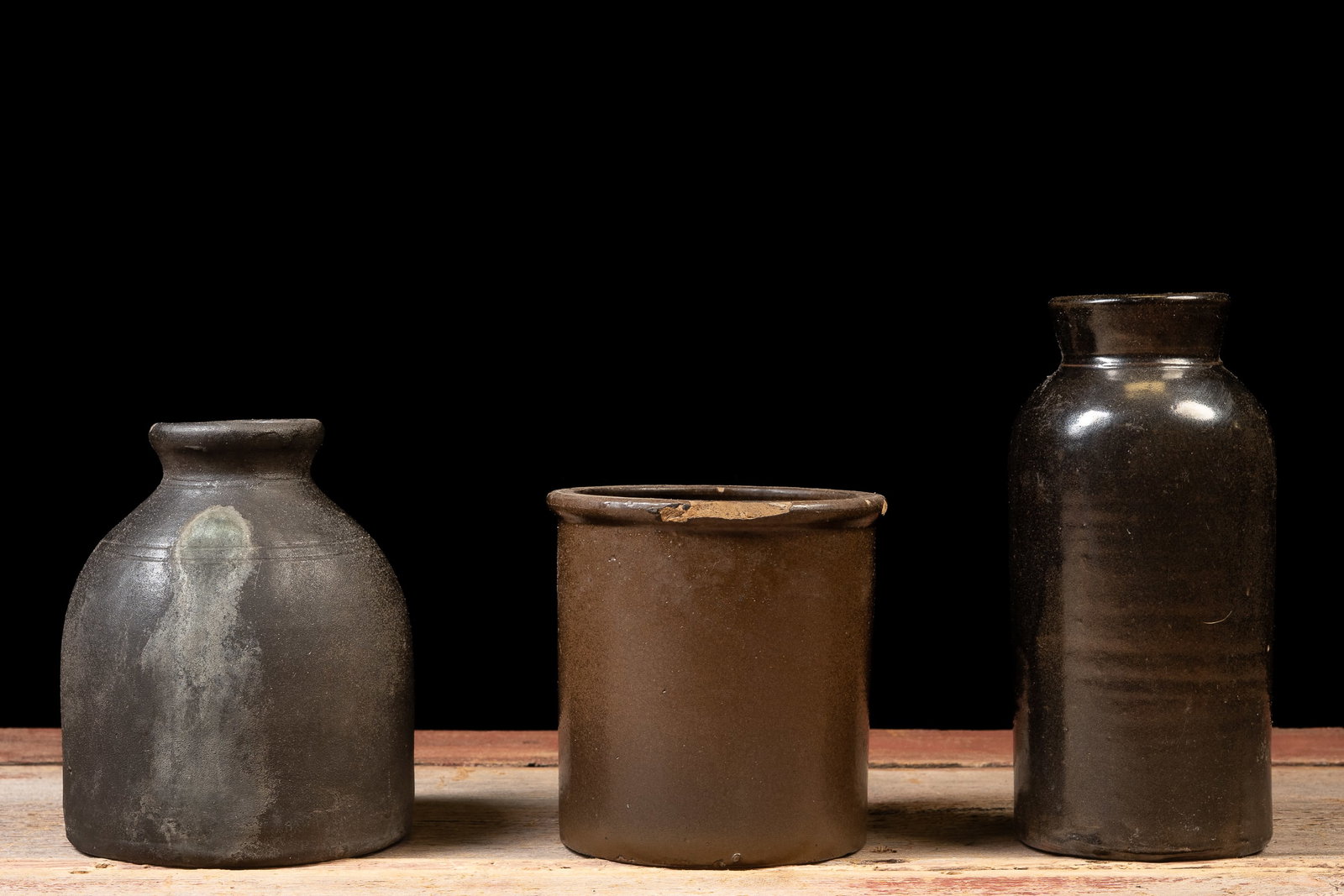 Three Brown Glazed Stoneware Vessels: **NOTE: Any shipping quotes provided on this screen or on your Live Auctioneers invoice are provided by Live Auctioneers. In-house shipping is available on all lots. For in-house shipping quotes,