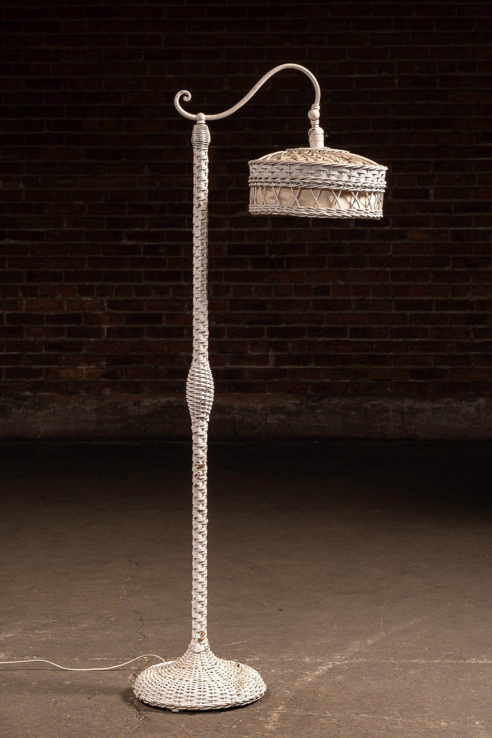 White Wicker Bridge Arm Lamp: **NOTE: Any shipping quotes provided on this screen or on your Live Auctioneers invoice are provided by Live Auctioneers. In-house shipping is available on all lots. For in-house shipping quotes,