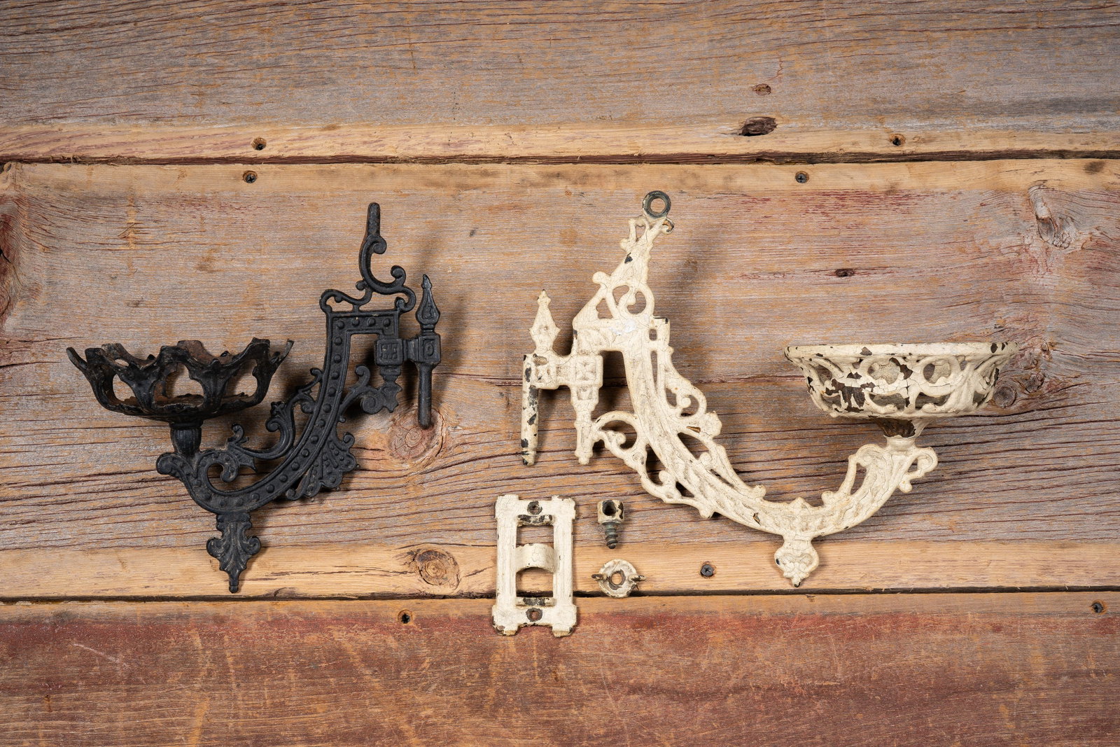 Two Cast Iron Oil Lamp Wall Brackets: **NOTE: Any shipping quotes provided on this screen or on your Live Auctioneers invoice are provided by Live Auctioneers. In-house shipping is available on all lots. For in-house shipping quotes,