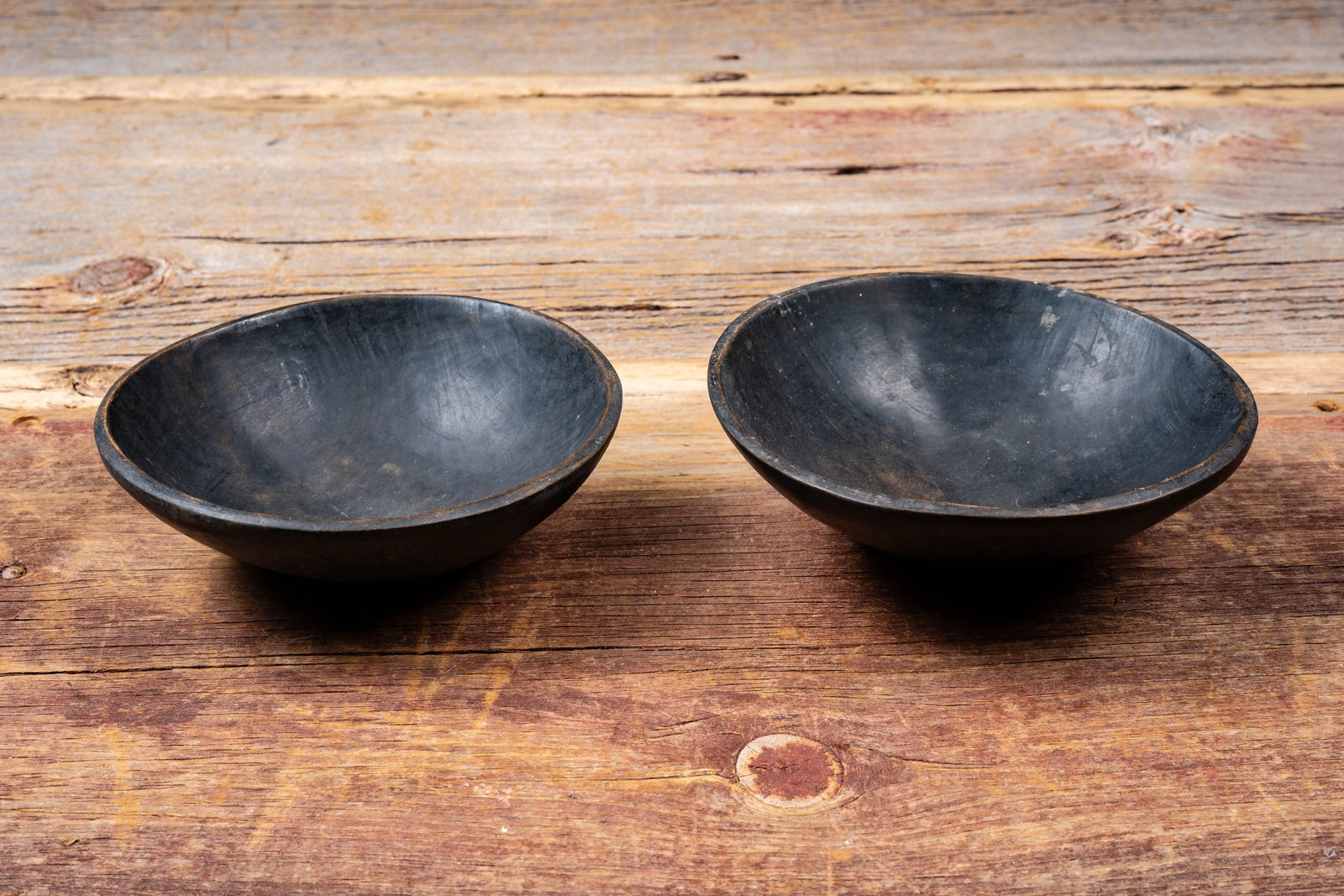 Lot of Two Primitive Turned Wooden Bowls: **NOTE: Any shipping quotes provided on this screen or on your Live Auctioneers invoice are provided by Live Auctioneers. In-house shipping is available on all lots. For in-house shipping quotes,