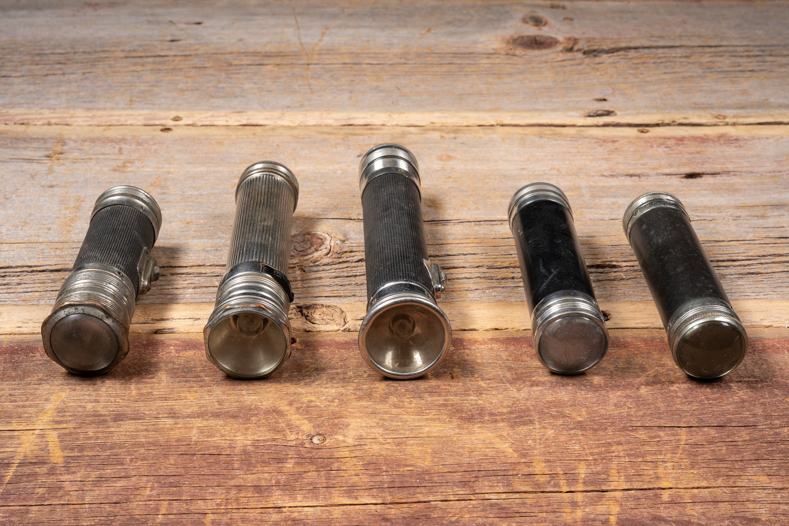 Group of Vintage Metal Flashlights: **NOTE: Any shipping quotes provided on this screen or on your Live Auctioneers invoice are provided by Live Auctioneers. In-house shipping is available on all lots. For in-house shipping quotes,