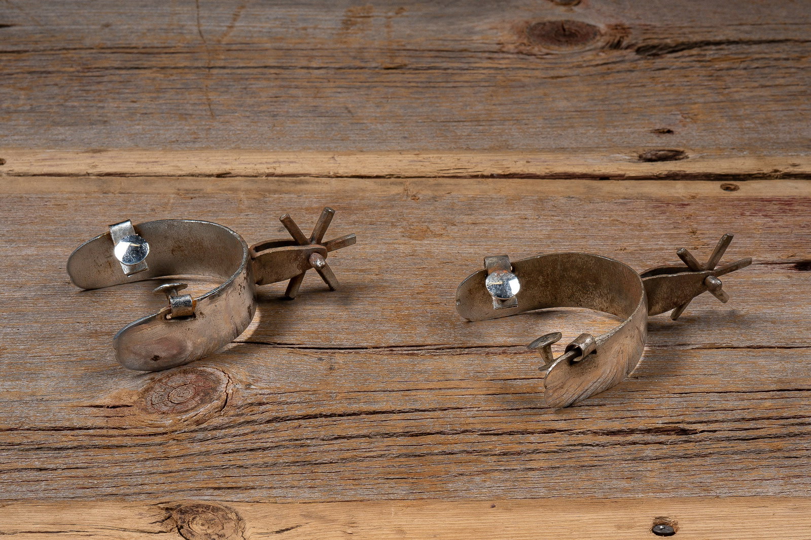 Pair of Western Riding Spurs: **NOTE: Any shipping quotes provided on this screen or on your Live Auctioneers invoice are provided by Live Auctioneers. In-house shipping is available on all lots. For in-house shipping quotes,