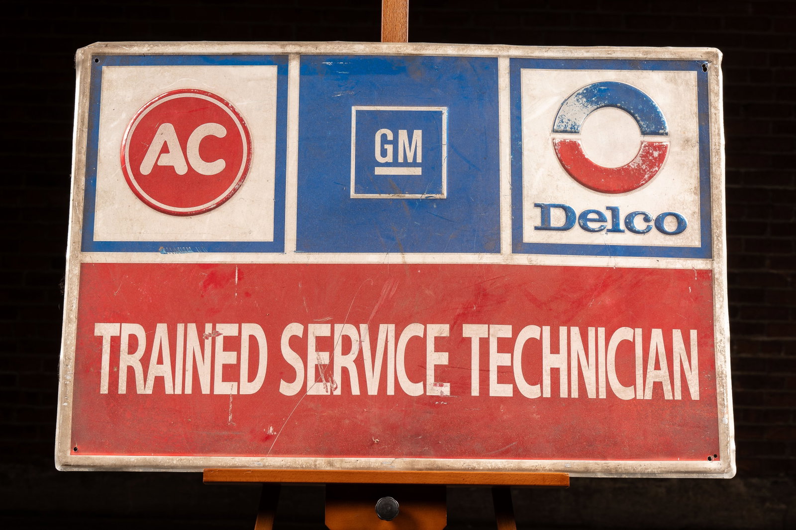 AC GM Delco Service Technician Embossed Alum. Sign: **NOTE: Any shipping quotes provided on this screen or on your Live Auctioneers invoice are provided by Live Auctioneers. In-house shipping is available on all lots. For in-house shipping quotes, plea