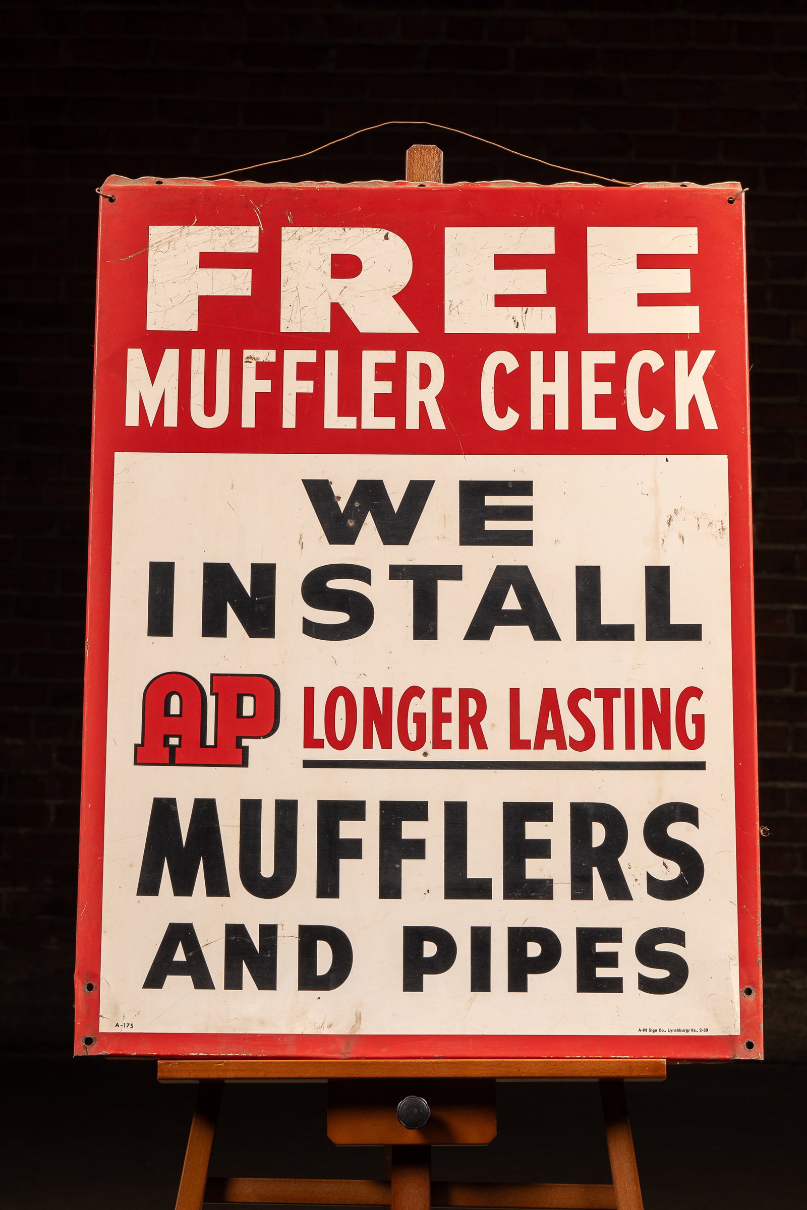 AP Lasting Mufflers Tin Tacker Sign, February 1959 (1 of 8)