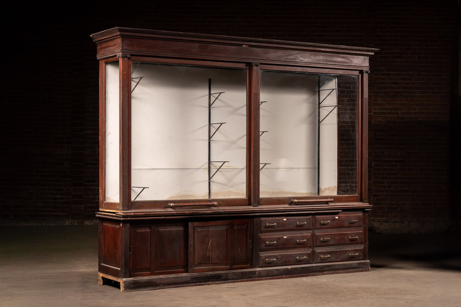 Massive Mercantile Display Case With Lifting Doors: **NOTE: Any shipping quotes provided on this screen or on your Live Auctioneers invoice are provided by Live Auctioneers. In-house shipping is available on all lots. For in-house shipping quotes, plea