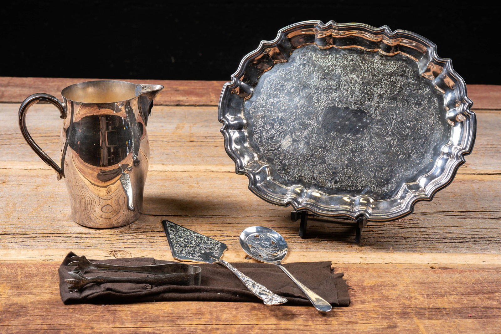 Lot of Mid-Century Silver Plate Serving Pieces: **NOTE: Any shipping quotes provided on this screen or on your Live Auctioneers invoice are provided by Live Auctioneers. In-house shipping is available on all lots. For in-house shipping quotes, plea
