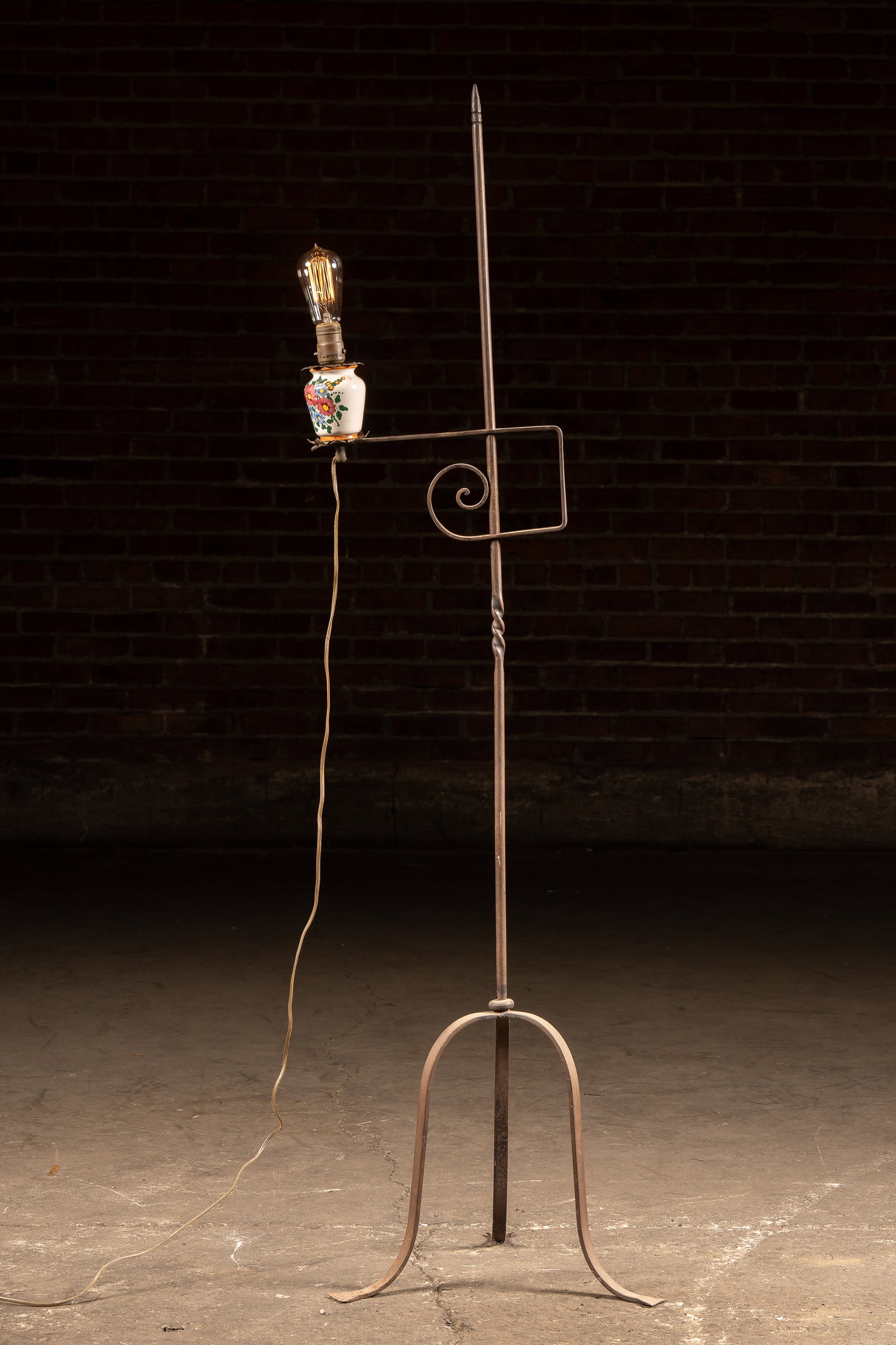 Wrought Iron Bridge Lamp w. Ceramic Floral Socket: **NOTE: Any shipping quotes provided on this screen or on your Live Auctioneers invoice are provided by Live Auctioneers. In-house shipping is available on all lots. For in-house shipping quotes, plea
