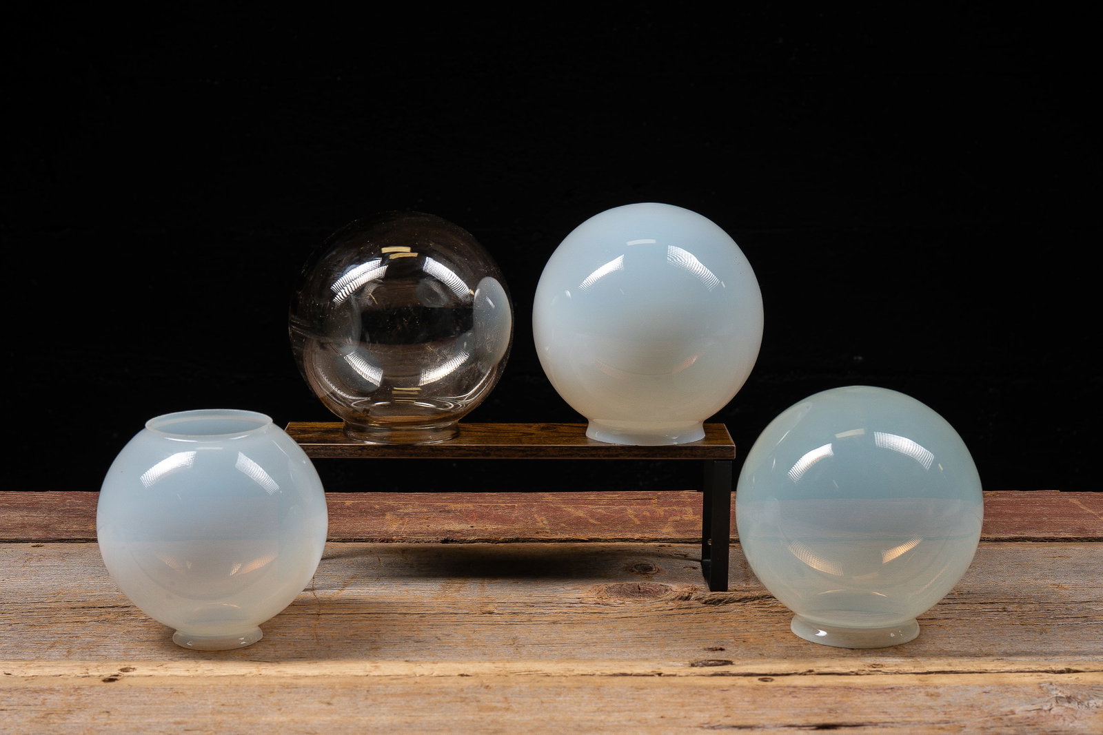 Lot of 4 White and Smoky Globe Lamp Shades: **NOTE: Any shipping quotes provided on this screen or on your Live Auctioneers invoice are provided by Live Auctioneers. In-house shipping is available on all lots. For in-house shipping quotes, plea