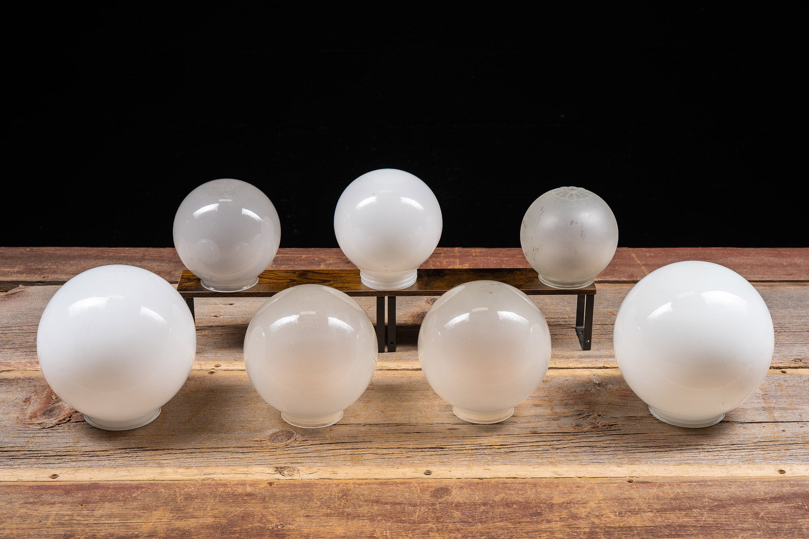 Lot of 7 White and Frosted Globe Lamp Shades: **NOTE: Any shipping quotes provided on this screen or on your Live Auctioneers invoice are provided by Live Auctioneers. In-house shipping is available on all lots. For in-house shipping quotes, plea